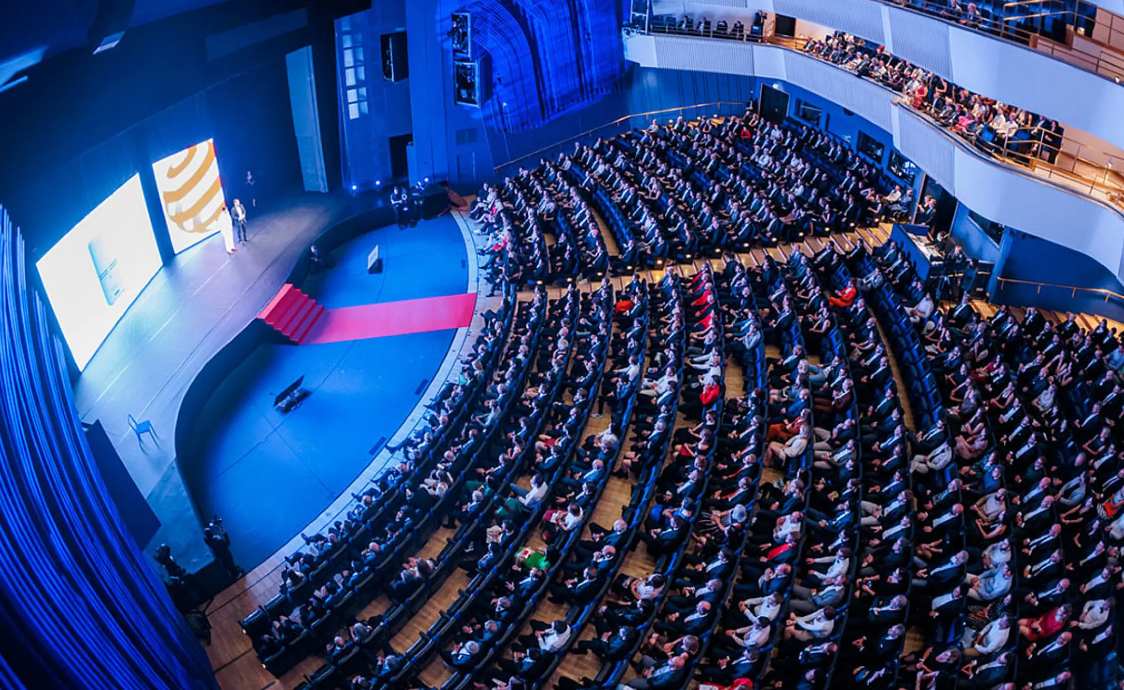 An interior view of the stage and audience seating at Konzerthaus in Berlin during a live performance