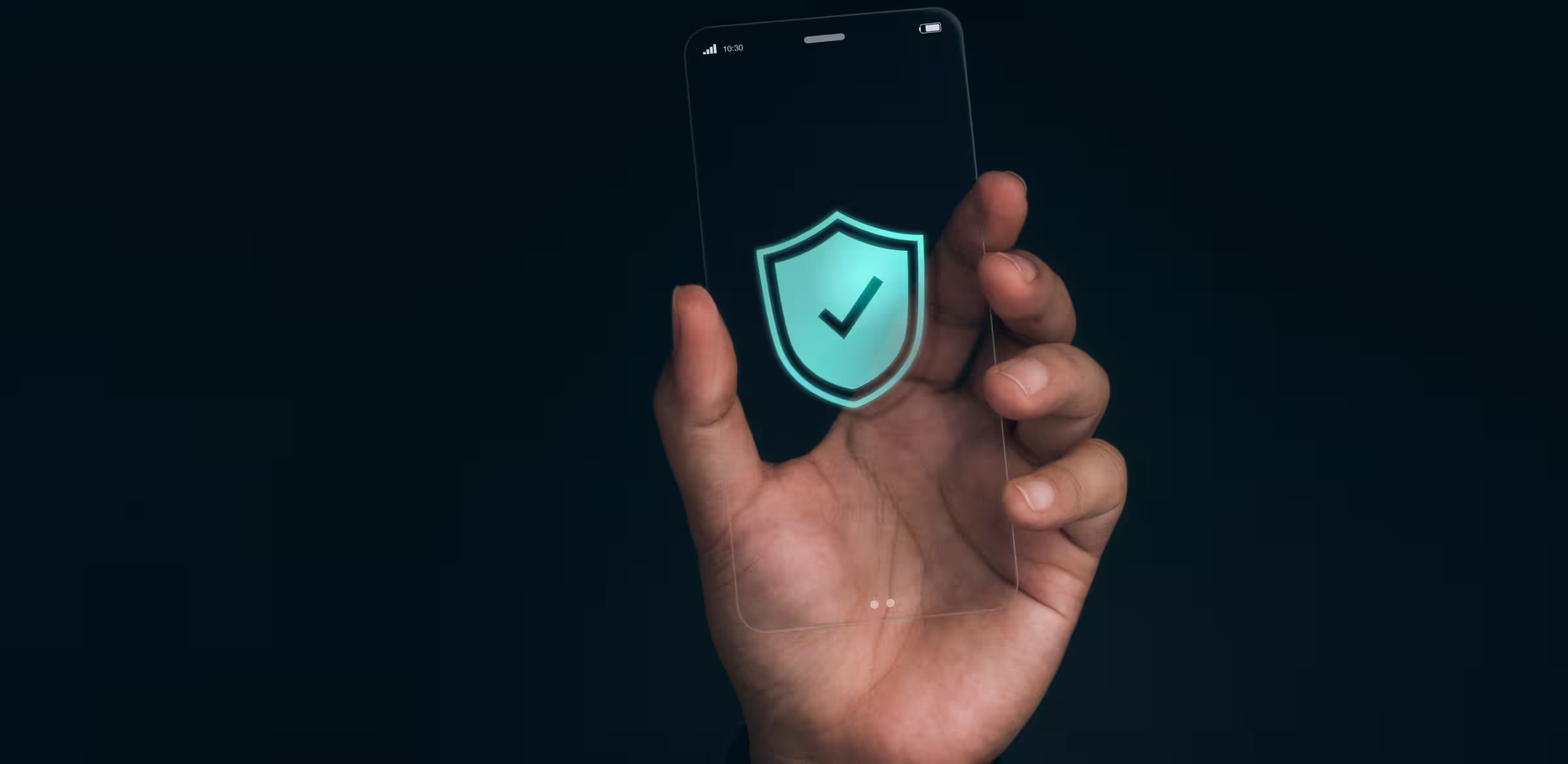 Close-up of a hand holding a transparent smartphone displaying a glowing shield with a checkmark icon, symbolizing digital security and data protection