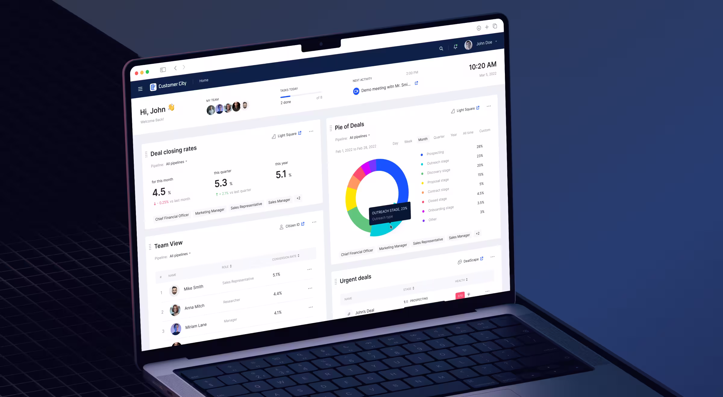 Laptop displaying a SaaS sales dashboard with deal conversion metrics, pipeline analytics, team performance data, and visual charts designed to support CRM management and revenue tracking.