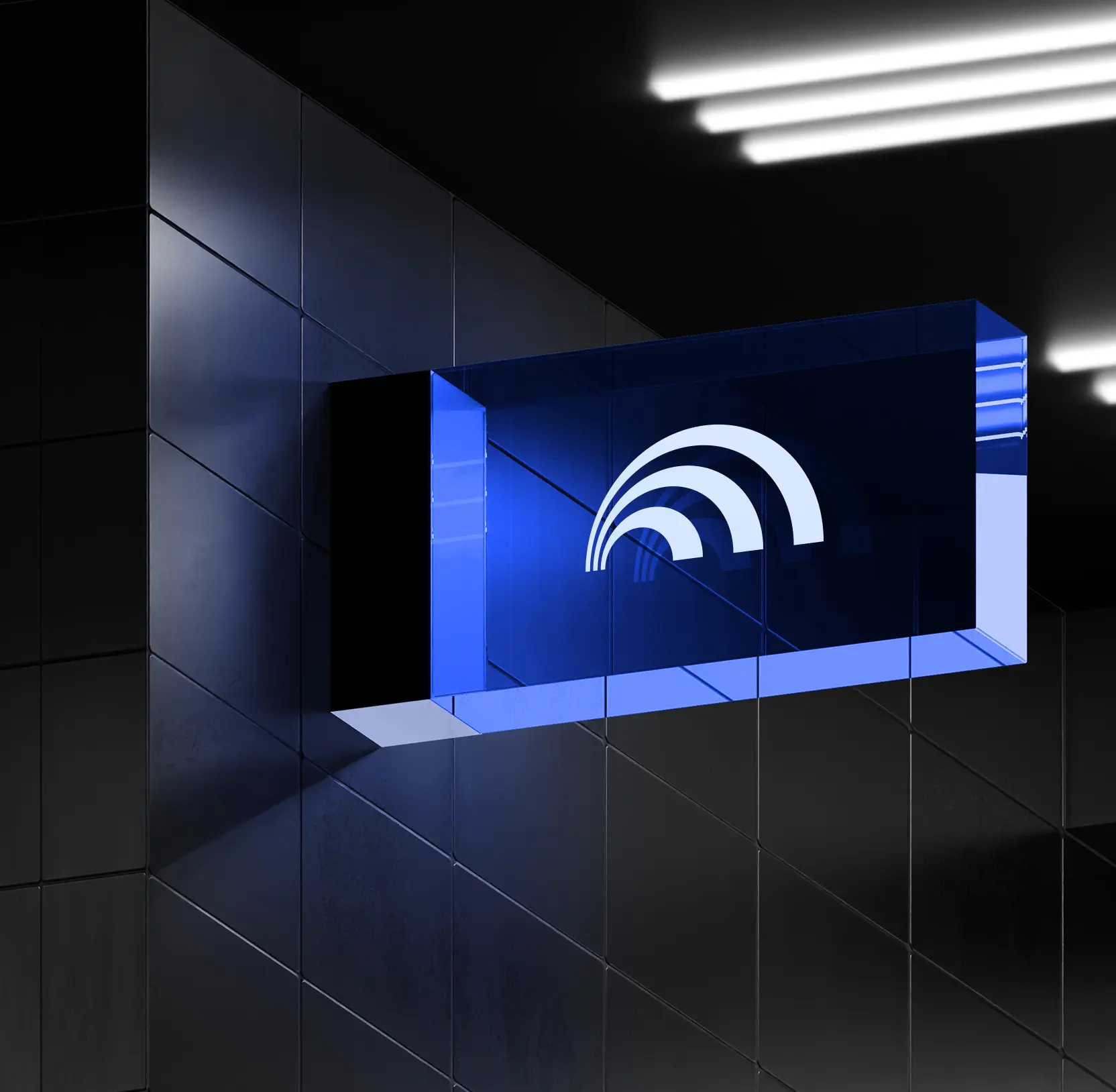 Dynascale arc symbol on an illuminated blue sign mounted to a dark tiled wall