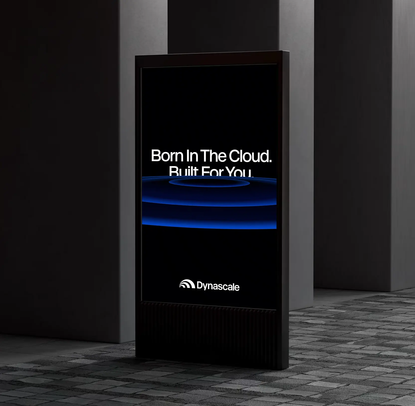 Outdoor digital display reading "Born In The Cloud. Built For You." with the Dynascale logo