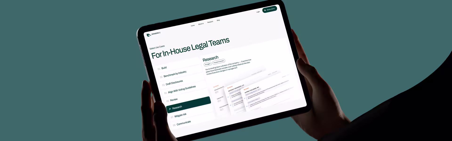 Hands holding a tablet showing the DragonGC use case page for in-house legal teams, with Research selected